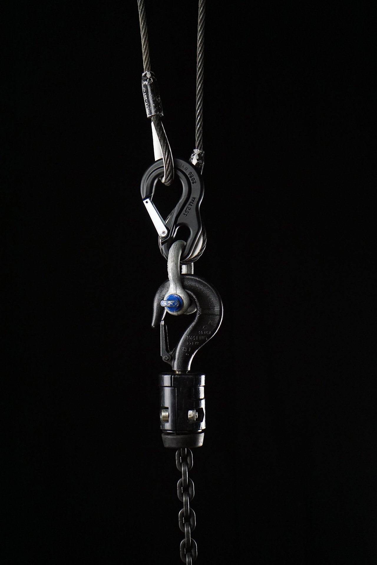 CanXio on a wire rope, shackle and hoist hook below